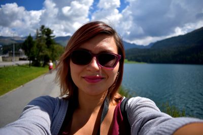 Portrait of young woman wearing sunglasses