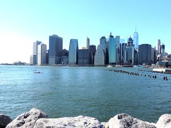 City skyline against blue sky