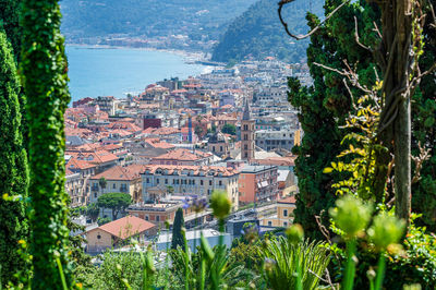 High angle view of townscape by lake