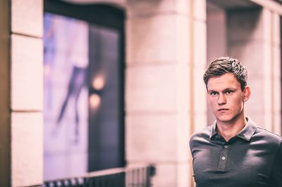 Portrait of man in city