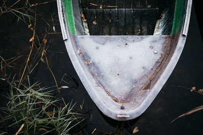 High angle view of abandoned container on field