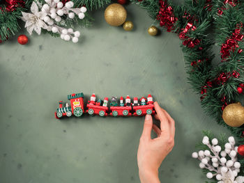 High angle view of christmas ornaments on tree