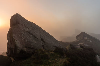 Scenic view of mountain against sky during sunset