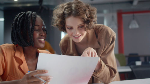 Close-up of woman using laptop