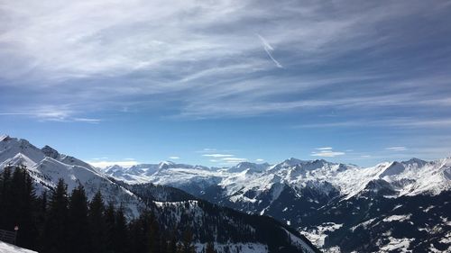 Scenic view of snowcapped mountains against sky