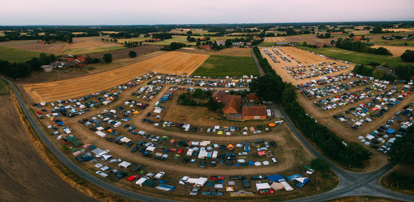 High angle view of vehicles on road against sky