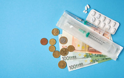 High angle view of information sign against blue background