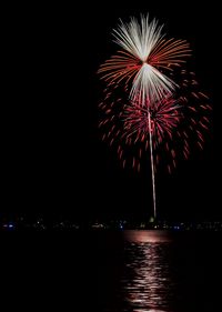 Firework display at night