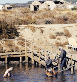 High angle view of man working in water