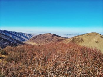 Scenic view of mountains against clear sky