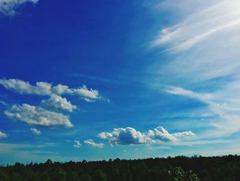 Scenic view of landscape against cloudy sky