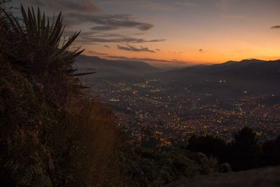 Scenic view of landscape against sky during sunset