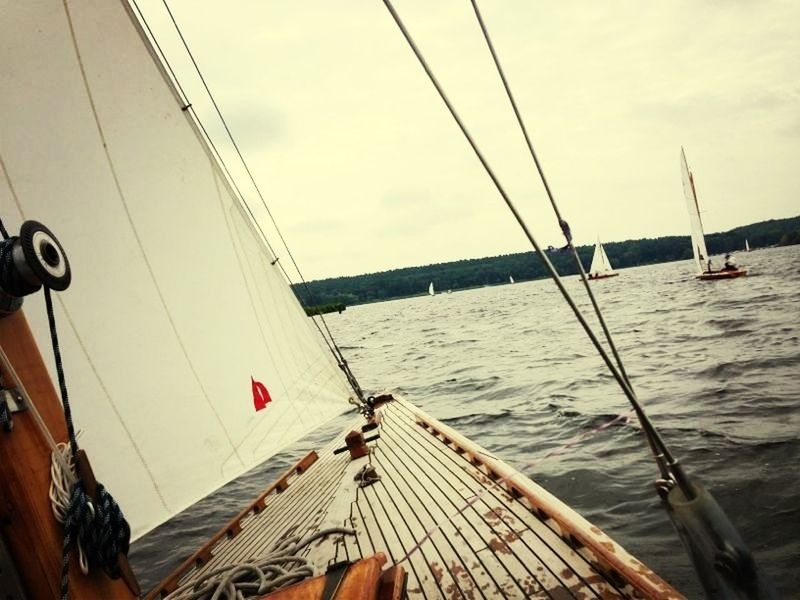 nautical vessel, transportation, boat, water, mode of transport, moored, sky, rope, sea, sailing, cropped, mast, pier, sailboat, part of, travel, day, nature, rippled, lake