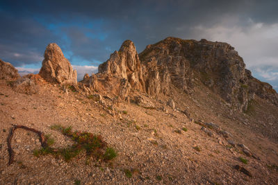 Scenic view of rocky mountains against sky