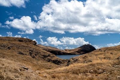 Scenic view of landscape and mountains against sky