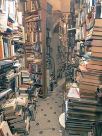 High angle view of books in shelf