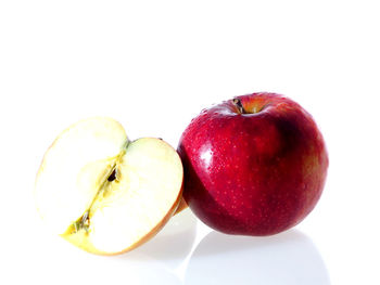 Close-up of strawberry over white background