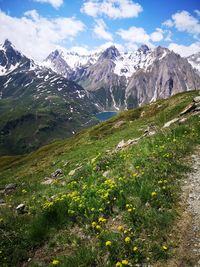 Scenic view of snowcapped mountains against sky