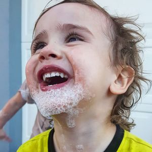 Close-up portrait of happy boy