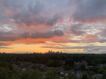 Panoramic view of townscape against sky during sunset
