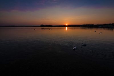 Scenic view of sunset over river