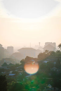 High angle view of townscape against sky during sunset