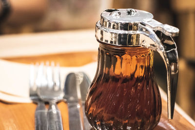 Close-up of wine glass on table