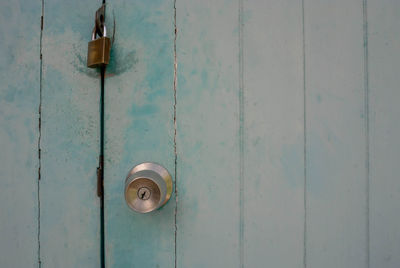 Close-up of padlock on door