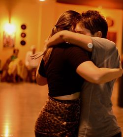 Rear view of couple kissing