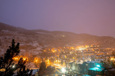 High angle view of townscape against sky at night