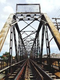 Empty railroad track against sky