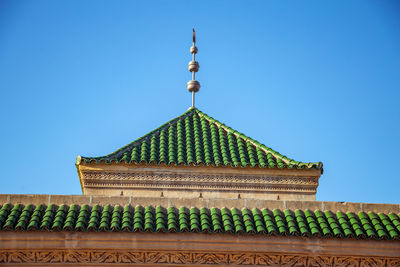 Low angle view of building against blue sky