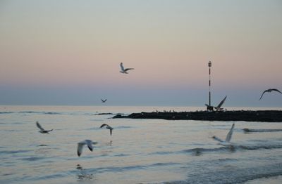 Scenic view of sea at sunset