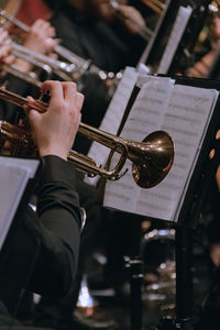 Cropped image of man playing drum