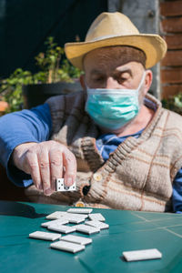 Portrait of man wearing mask