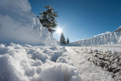 Low angle view of snowcapped mountain against sky