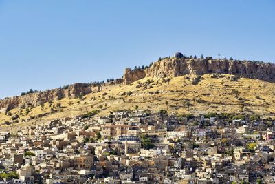 Panoramic view of mardin old city against clear sky