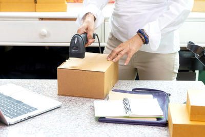 Man using laptop on table