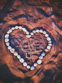 Close-up of heart shape on table