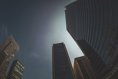 Low angle view of modern buildings against sky