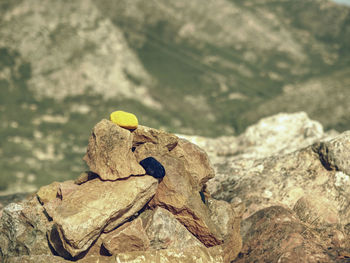 Follow way marked with yellow and blue stones. stony pile stacked at trekking path