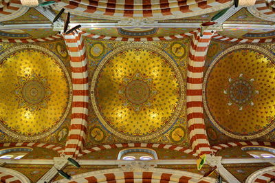 Low angle view of ceiling of temple