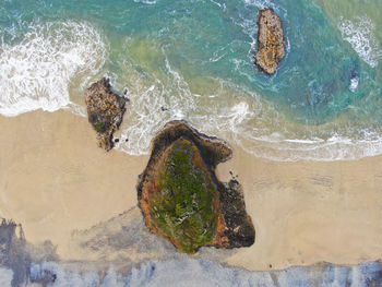 High angle view of rocks on beach