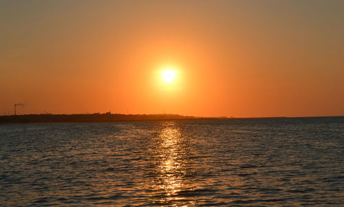 Scenic view of sea during sunset