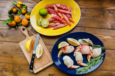 High angle view of fruits in plate on table