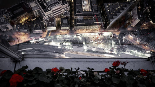 Illuminated cityscape during winter at night