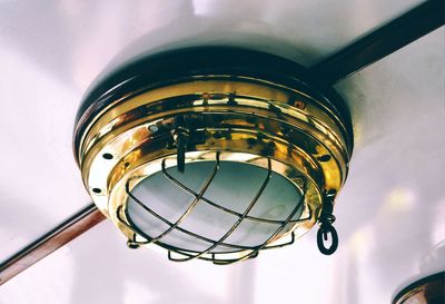 Low angle view of illuminated lamp against sky