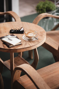 Empty coffee cup on table in cafe