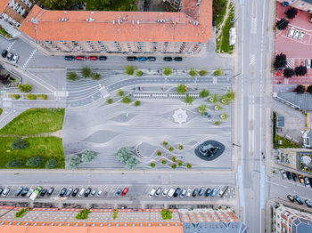 High angle view of road by building in city