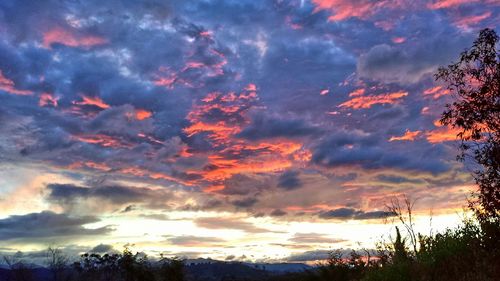 Scenic view of landscape against cloudy sky